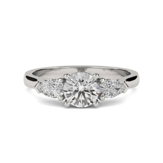 Eleganter Trilogie-Ring mit runden und birnenförmigen Diamanten