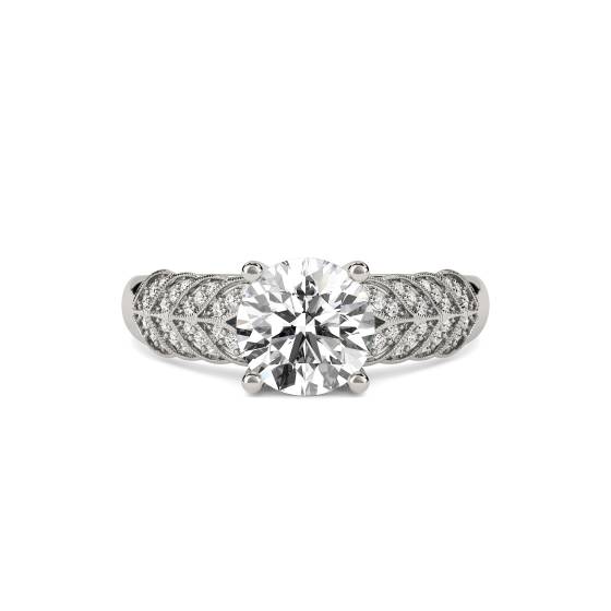 Vintage-Ring mit messerscharfem Blattmotiv und rundem Diamanten