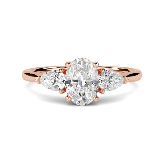 Traditioneller Trilogie-Ring mit ovalem und birnenförmigem Diamanten