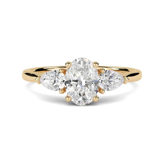 Traditioneller Trilogie-Ring mit ovalem und birnenförmigem Diamanten