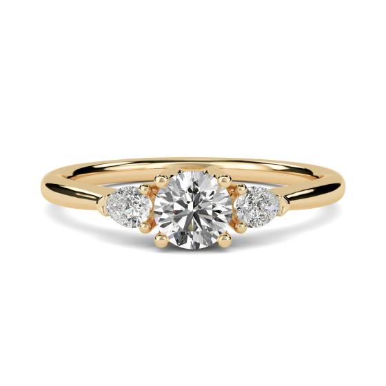 Trilogie-Ring mit rundem und birnenförmigem Diamanten