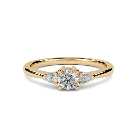 Eleganter Trilogie-Ring mit runden und birnenförmigen Diamanten