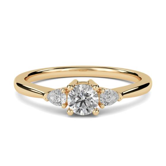 Eleganter Trilogie-Ring mit runden und birnenförmigen Diamanten